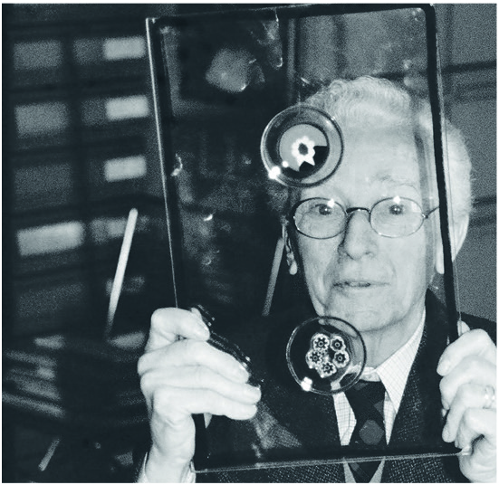 Image of Bruno Munari in his studio: he's working on a poster by Munari,  Bruno (1907-98)